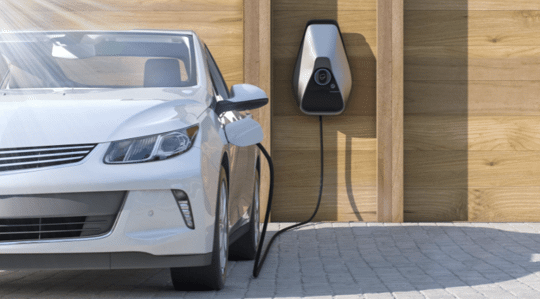 Electric car charging in driveway