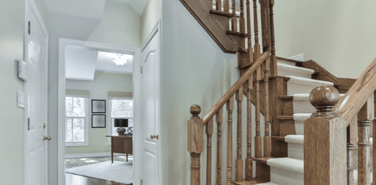 Wooden staircase in airy home