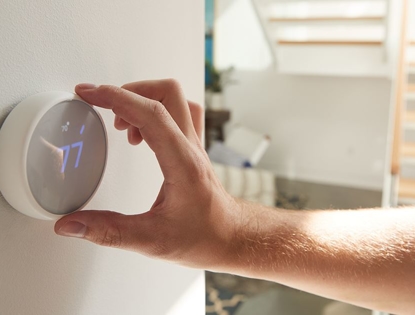 hand adjusting thermostat
