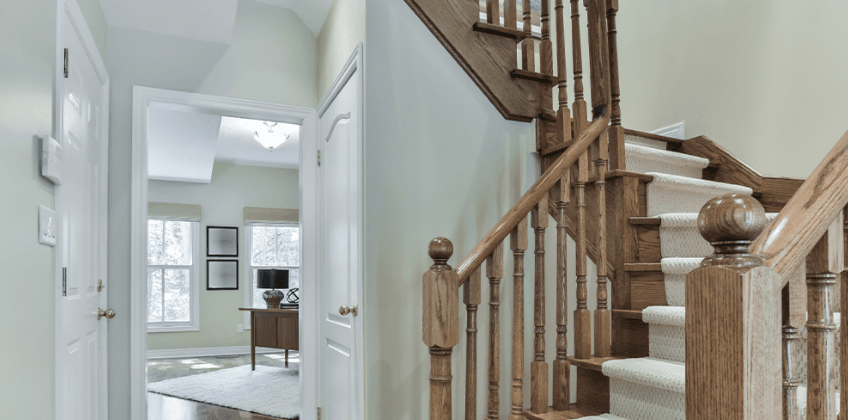 Wooden staircase in airy home